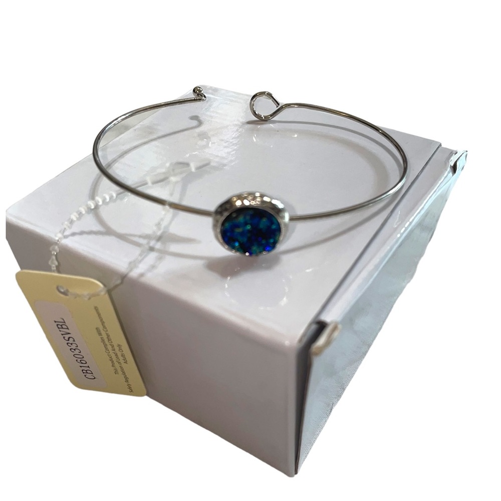 NWT Envy silver bangle bracelet with blue stone
